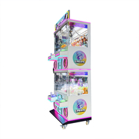 Machine à griffes moderne à 4 postes, table attrape-jouets avec de grands compartiments de récompenses pour les zones de jeux des centres commerciaux