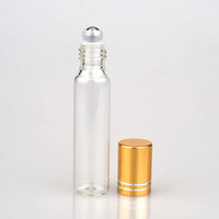Flacon de parfum miniature rond en verre transparent de 10 ml, pas cher, personnalisé, pour huile essentielle, gloss à lèvres, avec bille roulante et bouchon métallique