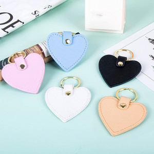 Venta caliente creativo personalizado lindo llavero en forma de corazón multicolor PU llavero de cuero creativo borla llaveros - Product Image 5