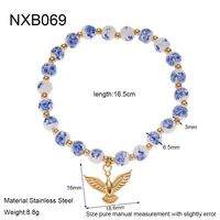Bijoux délicats en acier inoxydable plaqué or 18 carats chaîne perlée perles en céramique perle Pigeon breloques couche bracelet pour femmes