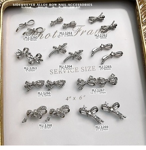 50 pièces de breloques pour ongles en alliage, motifs nœud papillon français et cravate 3D, ornements métalliques pour la décoration de manucure - Product Image 1