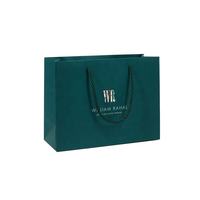 Sacs en papier d'emballage de luxe pour cadeaux, sacs de shopping en carton avec logo personnalisé, sacs de vêtements noirs pour la vente au détail, avec poignée en ruban