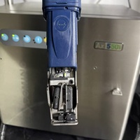 Imprimante jet d'encre industrielle Domino Ax550i d'occasion – Dispositif de marquage haute performance pour le codage des cartons et des bouteilles en plastique
