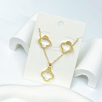 Nouvelle collection de bijoux Clover en cuivre plaqué or 14 carats, ensemble collier et boucles d'oreilles classiques à motif de fleur porte-bonheur pour mariage et soirée