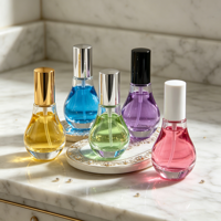Flacon compte-gouttes en verre transparent rond créatif de 30 ml avec étiquettes personnalisées OEM/ODM pour le stockage d'huiles essentielles, de parfums et d'essences