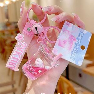 2024 New Cartoon Pendant Custom Keyrings Snowflake Sakura Sequins Promotional Backpack Oil <b>Floating</b> Liquid Acrylic Keychain - Product Image 1