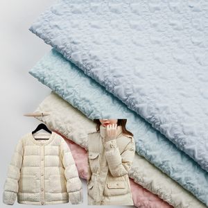 2024 populaire imperméable respirant 3D en relief écrasé 100% Polyester tissu extensible pour les filles veste d'hiver vêtement de mode - Product Image 1