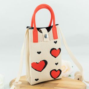 Venta al por mayor de <span class=keywords><strong>invierno</strong></span> de moda Punto de <span class=keywords><strong>ganchillo</strong></span> bolsa de <span class=keywords><strong>bolsos</strong></span> de mano teléfono crossbody bolsas de las mujeres lindo mini bolso de mano para las niñas - Product Image 2