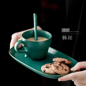 Il ristorante del brunch dei bicchieri di colore personalizzato ha usato la tazza di caffè del cereale della porcellana con il piatto ovale