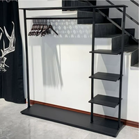 Meubles de boutique personnalisés pour magasins de détail de vêtements porte-vêtements en métal noir sur pied pour vêtements