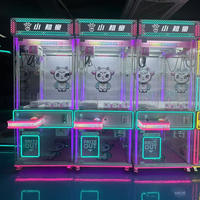 Meilleur prix Commercial Arcade Magic HUman Claw Crane Machine Prize Catcher Boutique Doll Coin Operated Vending Game Machine