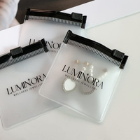 Pochettes cadeaux de luxe personnalisées en plastique transparent avec logo, petits sacs givrés à fermeture éclair pour boucles d'oreilles, sacs d'emballage à fermeture éclair