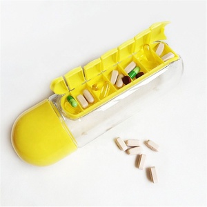 Boîte à médicaments ronde portable en plastique de 7 jours, colorée, avec gobelet détachable et rappel, en PP, vente en gros - Product Image 4