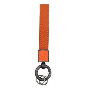 พวงกุญแจหนังลายลิ้นจี่เรียบง่าย พวงกุญแจคู่โลหะพร้อมสายคล้องมือ จี้ห้อยกระเป๋า สลักชื่อได้ เป็นของขวัญ ทำจาก PU และโลหะผสมสังกะสี - Product Image 5