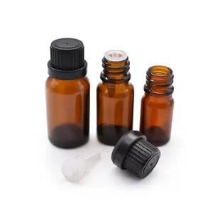 Élégant flacon en verre ambré de 10ml avec compte-gouttes Euro et bouchon noir visible essentiel pour les sérums et huiles de soins de la peau