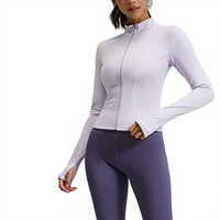 Veste de sport légère en polyester pour femme, respirante, anti-UV, coupe ajustée, manches longues, taille élastique, haut court pour la course et le fitness