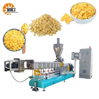 Ligne de production de machine d'extrudeuse de presse de fabrication d'aliments de casse-croûte de flocons de maïs de céréale de petit déjeuner