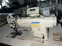 Machine à coudre industrielle d'occasion Juki LH-3568A-7 à double aiguille, plate, semi-sèche, avec coupe-fil automatique