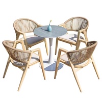 Ensemble de table et chaises en teck massif pour l'extérieur, style moderne et luxueux, avec chaise en corde et teck