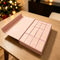 Boîte cadeau calendrier de l'avent rose magnétique rigide écologique haut de gamme avec 24 compartiments numérotés style tiroir et logo en feuille d'or |