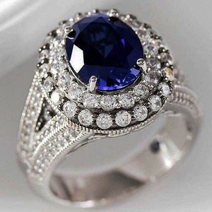 Anello da donna elegante con zirconi intarsiati blu zaffiro per eventi di anniversario - Product Image 1