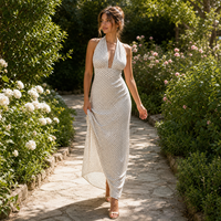 Robe longue blanche à pois en mousseline de polyester froncée, dos nu, sans manches, style licou, pour soirée et cérémonie, vente en gros, OEM, sur mesure, directement de l'usine