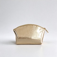 Organisateur de toilette élégant en similicuir or champagne, trousse de beauté autoportante à clapet pour sac à main de soirée pour femmes