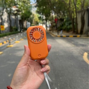 Mini ventilateur portatif X30mini Orange, batterie rechargeable, charge sans fil, ventilateur de poche compact et portable pour étudiants - Product Image 1