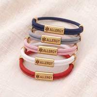 Bracelet anti-allergie en acier inoxydable avec barre gravée en or 18 carats et cordon en nylon double tressé pour hommes et femmes