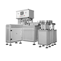 Machine automatique HONGREAT pour l'ajout de capuchons aux tubes de prélèvement sanguin