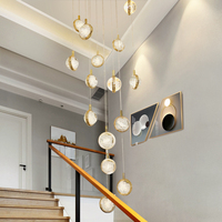 Lustre long en cristal de luxe léger pour villa duplex, design créatif et personnalisé, idéal pour chambre à coucher, chevet, restaurant, bar, escalier