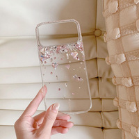 Étui antichoc élégant de style niche, transparent avec accents de diamants, pour 17 Pro Max, deux-en-un, bords souples, dos rigide en acrylique, fait main