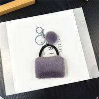 Mini sac à main de luxe en peluche douce avec pompon, breloque décorative en fausse fourrure, pendentif pour sac à dos, cadeau pour femme