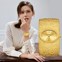 Montre-bracelet de luxe vintage ovale pour femme, à quartz, avec bracelet en métal texturé, élégante pour le quotidien et les occasions professionnelles, pour fille