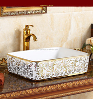 Lavabo à poser en céramique plaqué or pour salle de bain