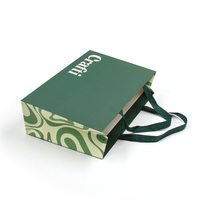 Sacs en papier vert de luxe pour emballages cadeaux, sacs en papier pour vêtements, sacs en papier personnalisés de bonne qualité