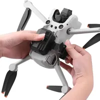 Système de largage par drone pour articles ménagers, dispositif de largage aérien par drone, système de largage par drone 2.4G avec télécommande, support de largage parabolique pour drone