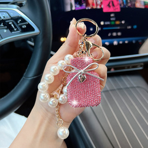 Crystal Rhinestone Perfume Bottle Keychain Pendant Pearl Bow Key Chain Bling Diamond Bag Car Hanging Jewelry Charms Womens Gifts
