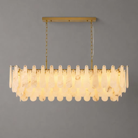 Lustre de luxe en albâtre avec abat-jour en laiton brossé en forme de goutte d'eau, suspension linéaire à deux niveaux en marbre pour hôtel et restaurant