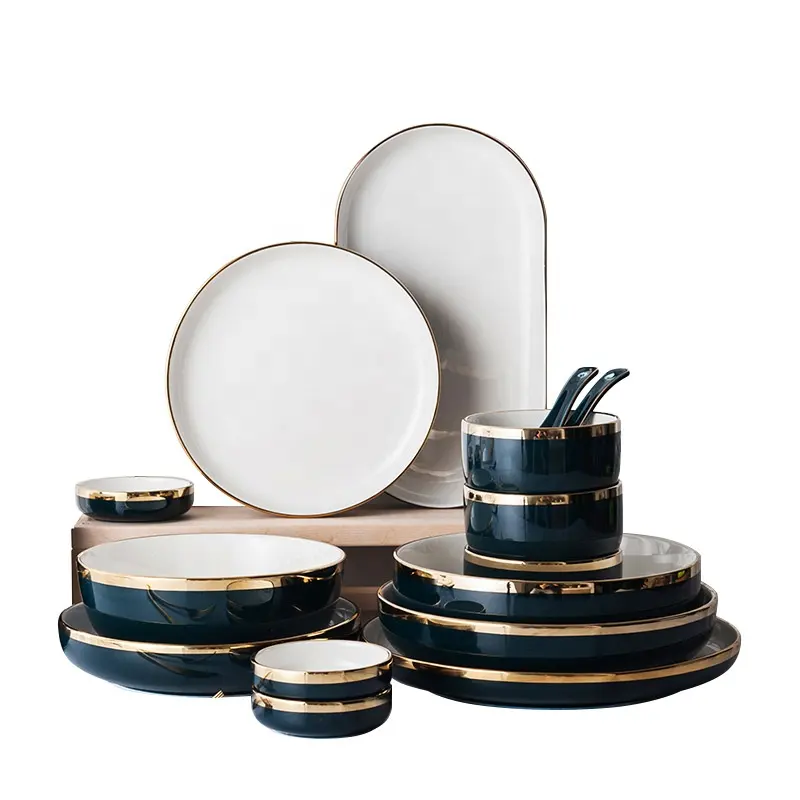 Conjunto de jantar preto de porcelana com bordas douradas e pratos de tigela