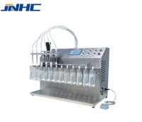 Machine de remplissage semi-automatique à 6 têtes pour sachets de liquides (boissons, détergents), avec composant moteur à pression d'air