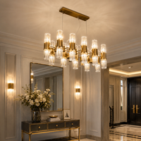Lustre linéaire doré à 12 lumières, hauteur réglable, style Art Déco, avec tiges en verre cannelé transparent pour salon, chambre, hôtel