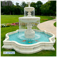 Fontaine de jardin en marbre de haute qualité, sculpture de fontaine à deux niveaux en pierre pour la décoration de la cour de la villa