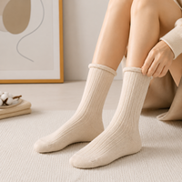 Chaussettes en laine mérinos mi-mollet OEM de haute qualité, épaisses, tricotées sur mesure, chaudes, pour l'automne et l'hiver