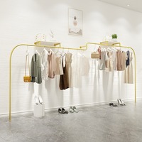 Vêtements muraux créatifs de luxe pour femmes, présentoirs en métal