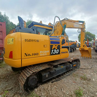 Excavatrice Komatsu PC130 d'occasion 2020, poids opérationnel 13 tonnes, moteur 68,4 kW, godet 0,7 m, composants essentiels (pompe, moteur) inclus