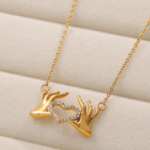 Collar con colgante de doble corazón de acero inoxidable, tono dorado, con incrustaciones de diamantes de imitación, joyería de regalo para mujer, moderno y a la moda, para la clavícula - Product Image 2