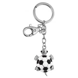 Llavero con diseño de tortuga blanca/negra, sin caja incluida - Product Image 1