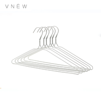 Cintre en fil de métal pour linge Guangxi Cintre jetable en PVC Cintre en métal coloré pour sécher les vêtements