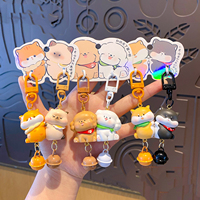 Hot verkopende schattige cartoonhond sleutelhanger in koppelstijl van hars, met schattig huisdierfiguurtje als dagelijks accessoire voor dierenliefhebbers.